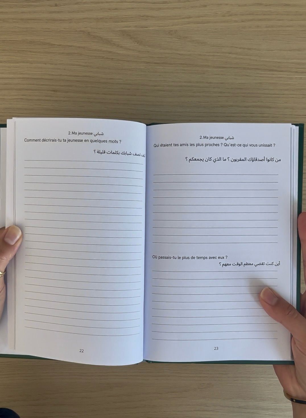 Pages intérieures du carnet Ya Abati — questions bilingues français-arabe